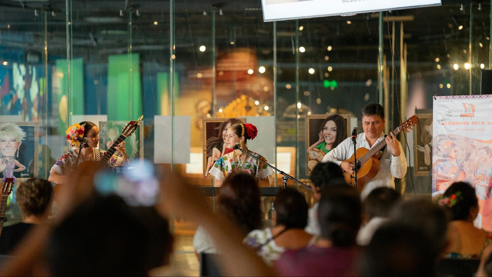 Guests mingling at an event in the Phoenix Art Museum.
