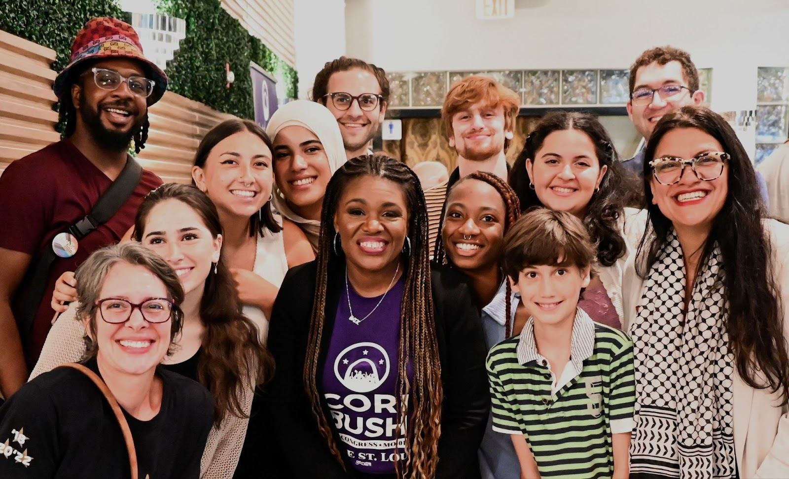 Rashida and Cori pose with canvassers