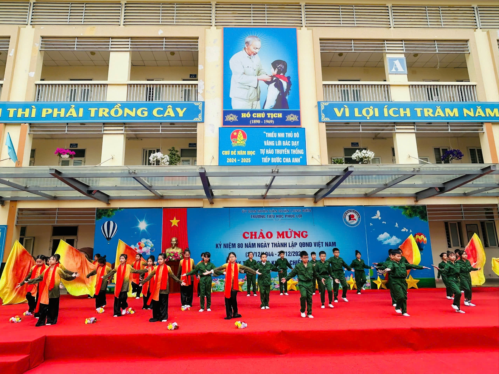 A group of people in uniform on a red carpet

Description automatically generated