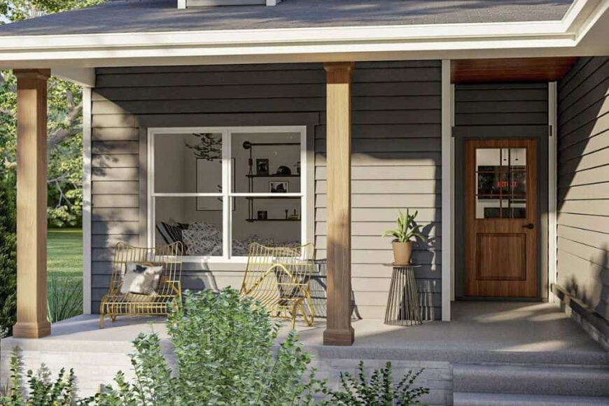 Covered porch with wooden pillars and lounge chairs.Covered porch with wooden pillars and lounge chairs.