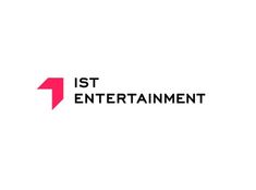 This contains an image of the ist entertainment logo is shown in red and black, with an arrow pointing up