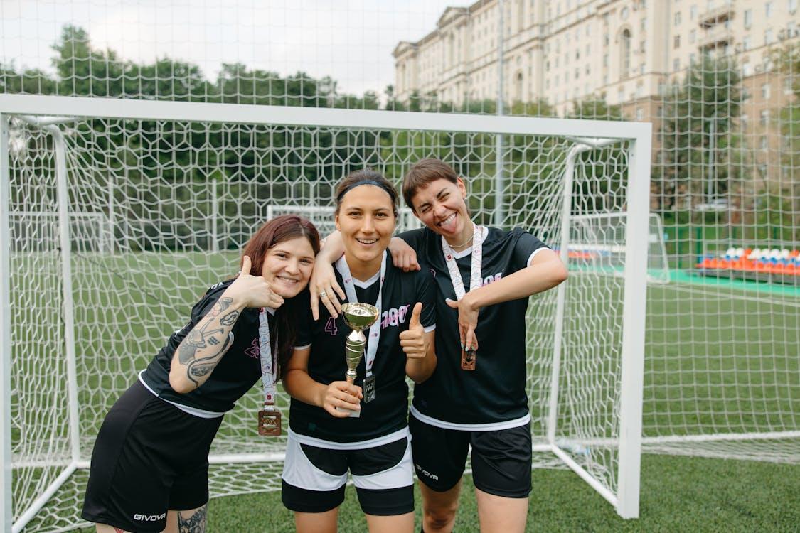 Free Woman Holding a Trophy Stock Photo