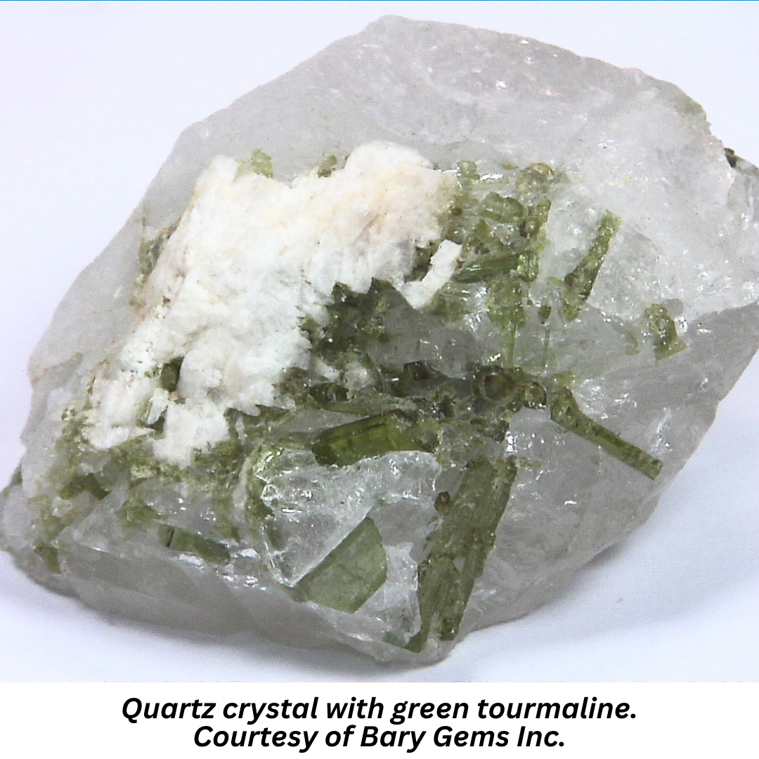 Quartz crystal with green tourmaline. Courtesy of Bary Gems Inc.