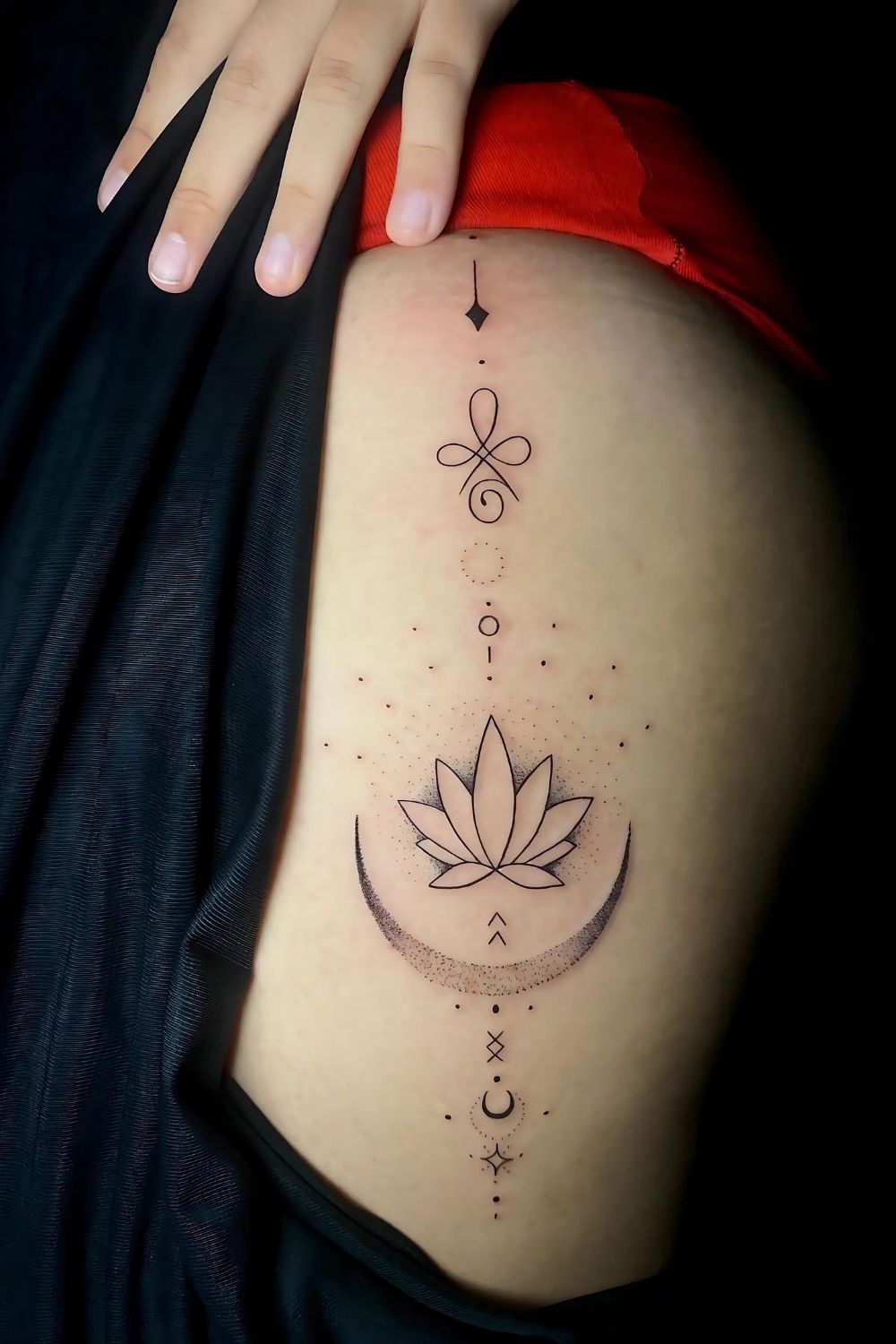 Elegant Side Thigh Tattoo