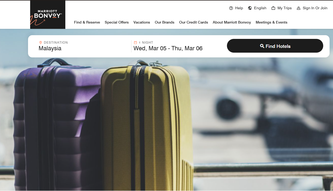 Two suitcases, one purple and one yellow, placed at an airport with a blurred airplane in the background, representing travel and adventure.