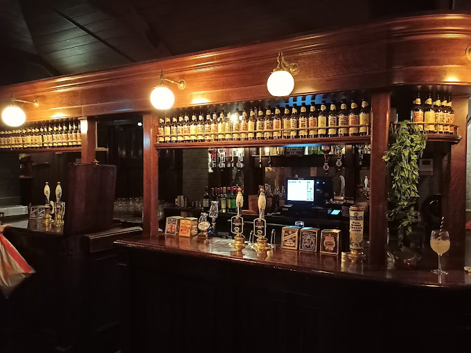 Ye Olde Cheshire Cheese pub in London, offering a cozy and traditional atmosphere for a unique pub tour experience