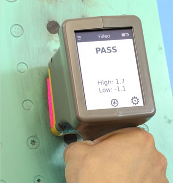 A hand holding a device

AI-generated content may be incorrect.