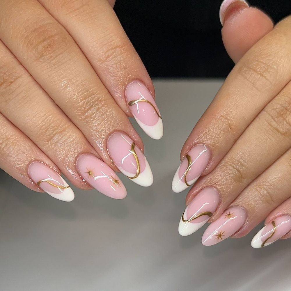 Simple White Nail Design having White and gold nails