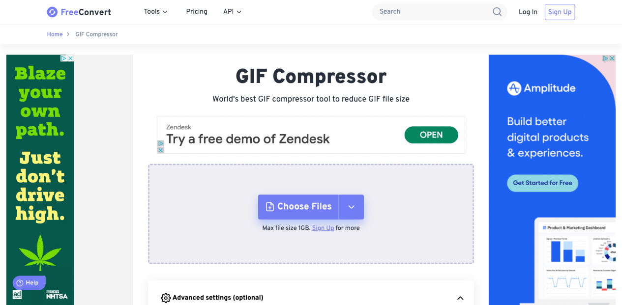 Screenshot of a webpage for a GIF Compressor tool on the FreeConvert website. The main feature is a blue ‘Choose Files’ button in the center, indicating where to upload files for compression. The page has a white background with light blue accents and an advertisement for Zendesk on the right side.