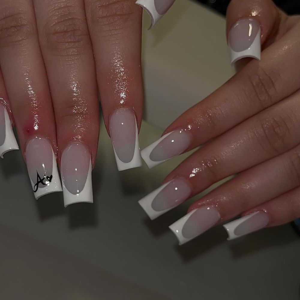 Simple White Nail Design having White french tip nails