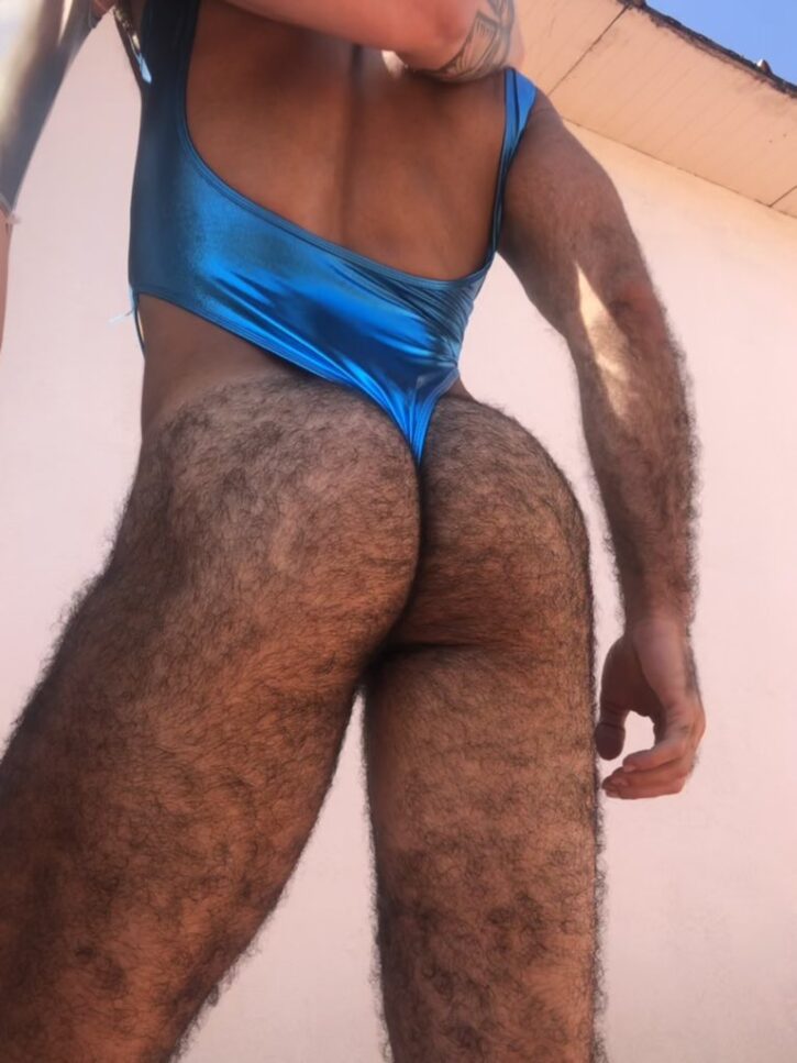 saleh helalat wearing shiny thong bodysuit showing off his hairy butt