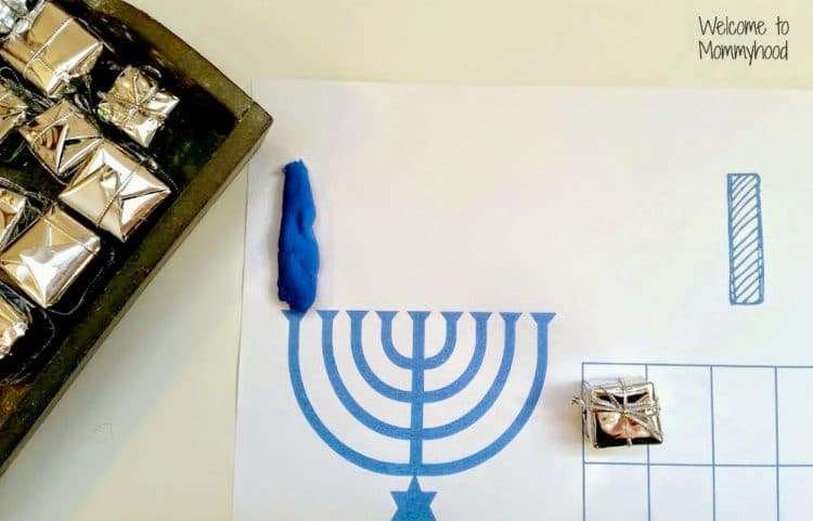 hanukkah playdough mat with menorah and playdough