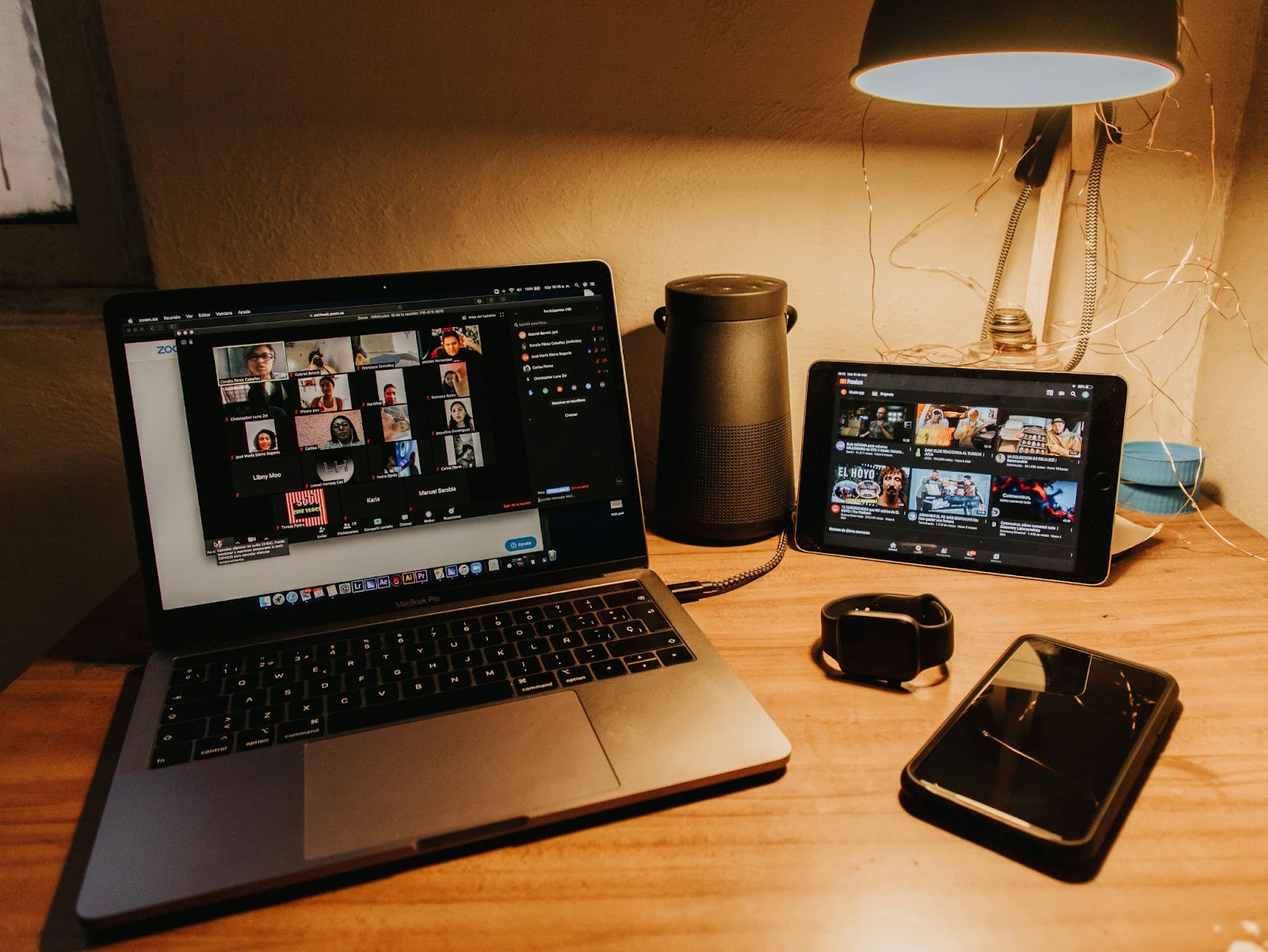 A laptop showing a team meeting happening on a video call