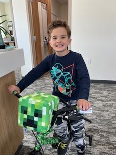 Lorenzo holding a prize