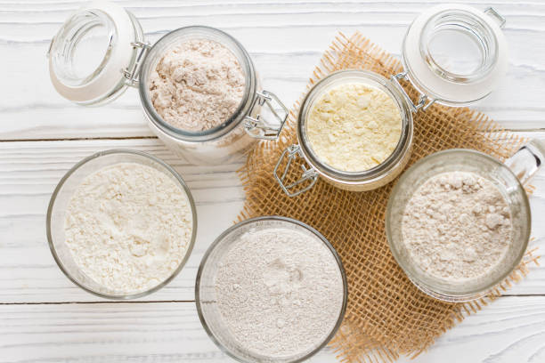 Different flour jars, wheat, corn, rye, oats, spelt, flax Different flour in glass jars, wheat, corn, rye, oats, spelt, flax organic flour stock pictures, royalty-free photos & images