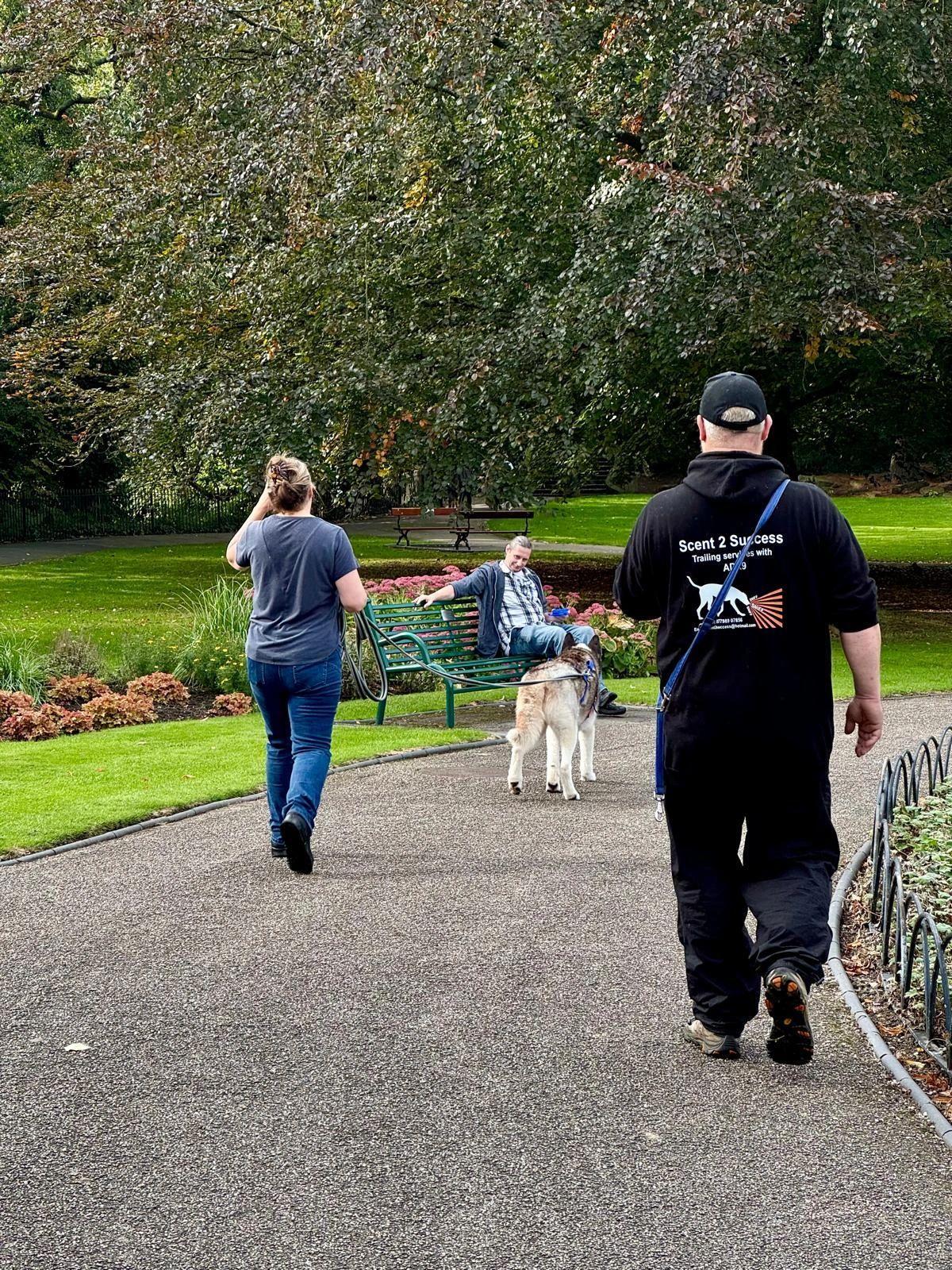 Aidy and his customer and their dog as they approach the runner
