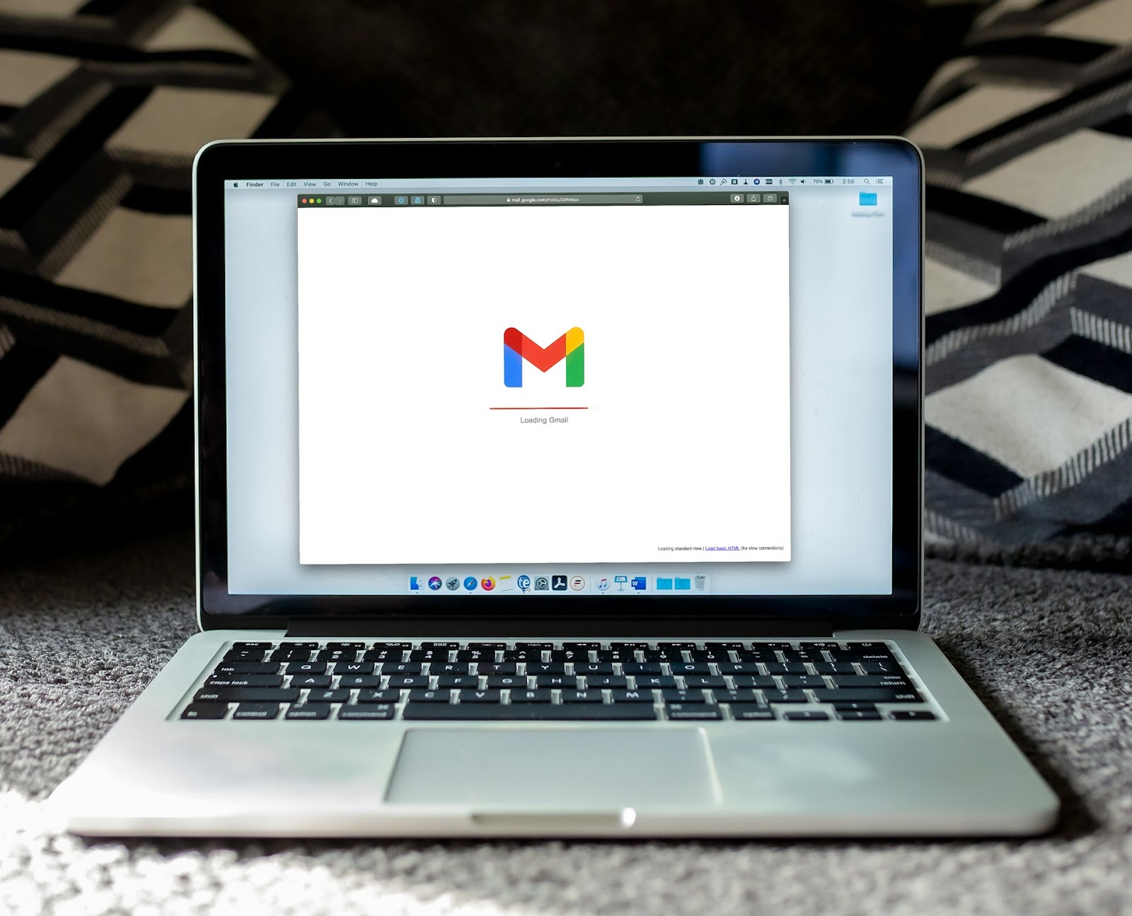 A laptop showing the Google Mail