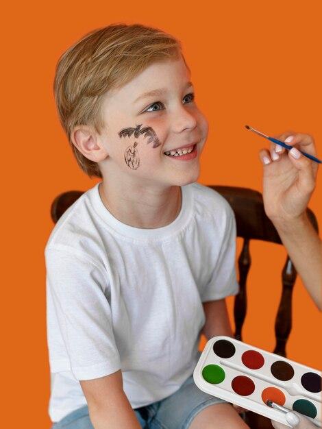 https://img.freepik.com/free-photo/portrait-smiley-child-with-face-painted-halloween_23-2148639196.jpg?semt=ais_hybrid