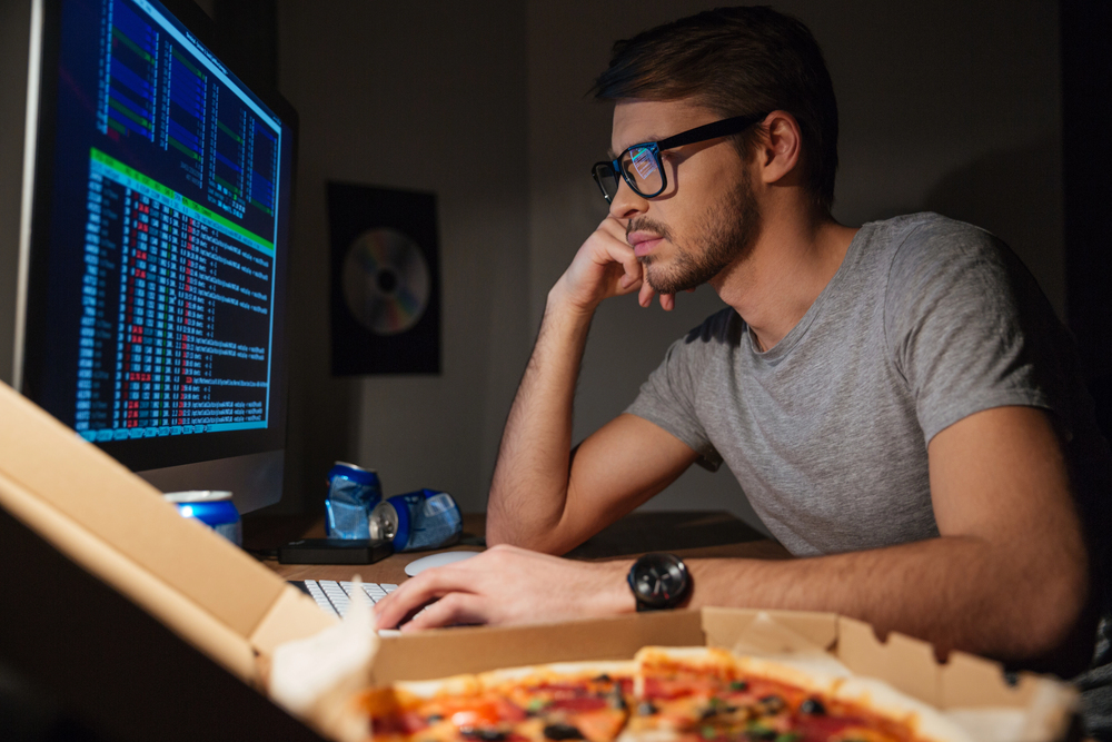 A young developer researching and testing video APIs