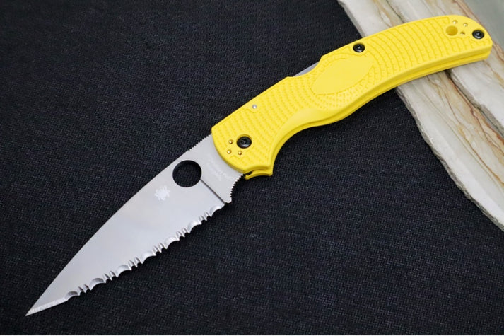 An image showing the Spyderco Native Chief Salt folding knife. It features yellow FRN handle scales and a drop point CPM-MagnaCut steel.