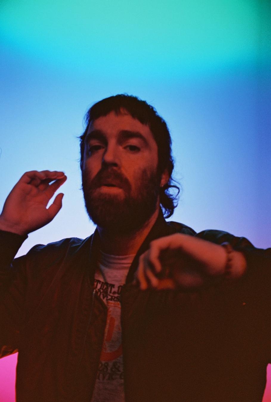 A person with a beard and mustache

AI-generated content may be incorrect.