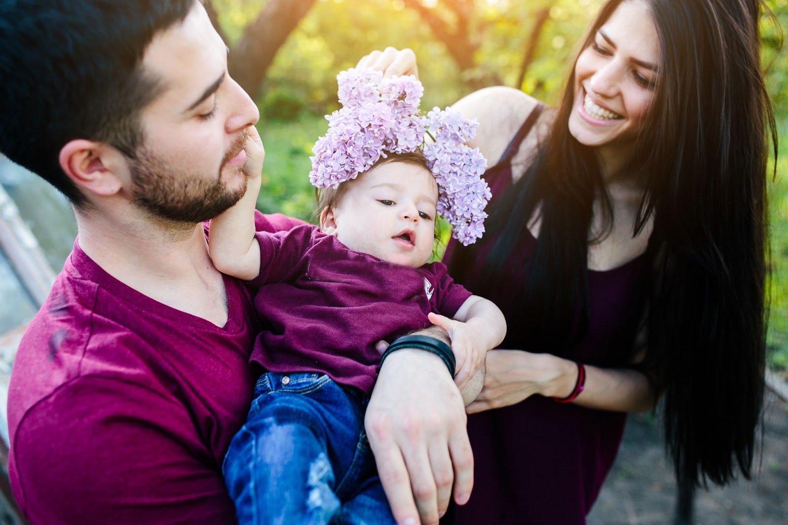 Happy parents enjoying their time with their child embracing perfect tips for new parents.