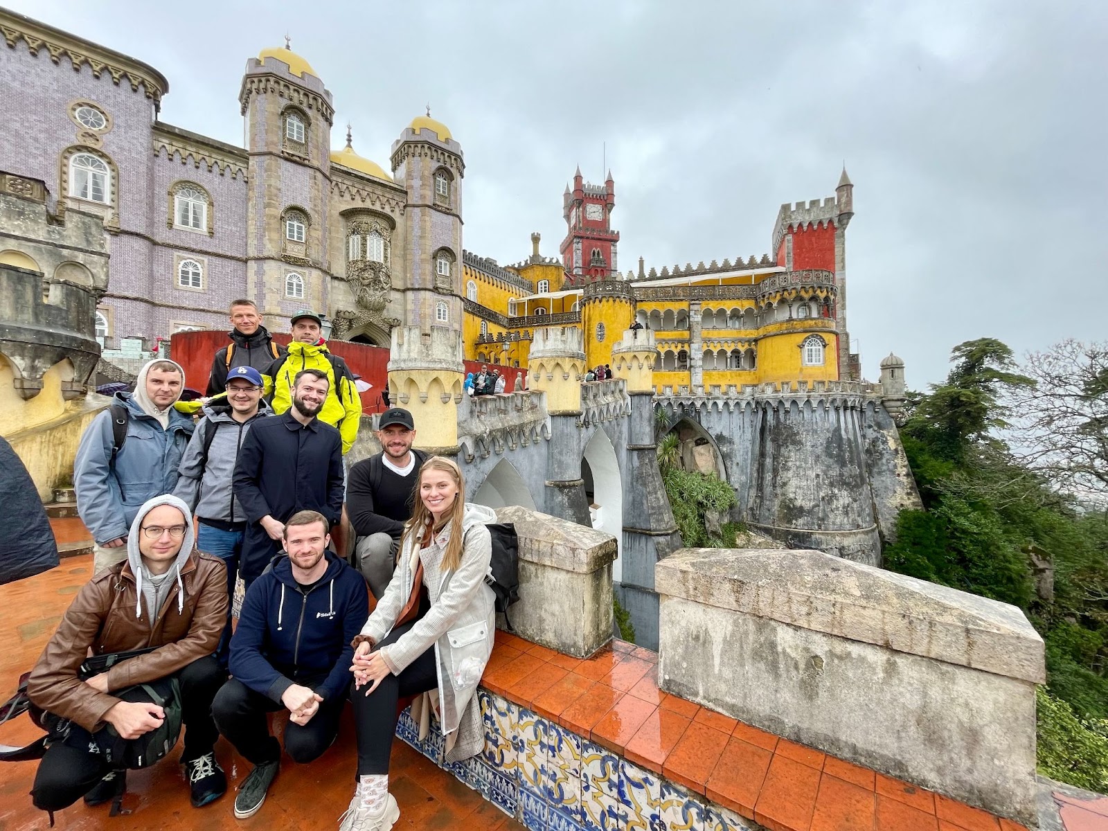 Nine primehammer members pose for a picture in Sintra, Portugal.