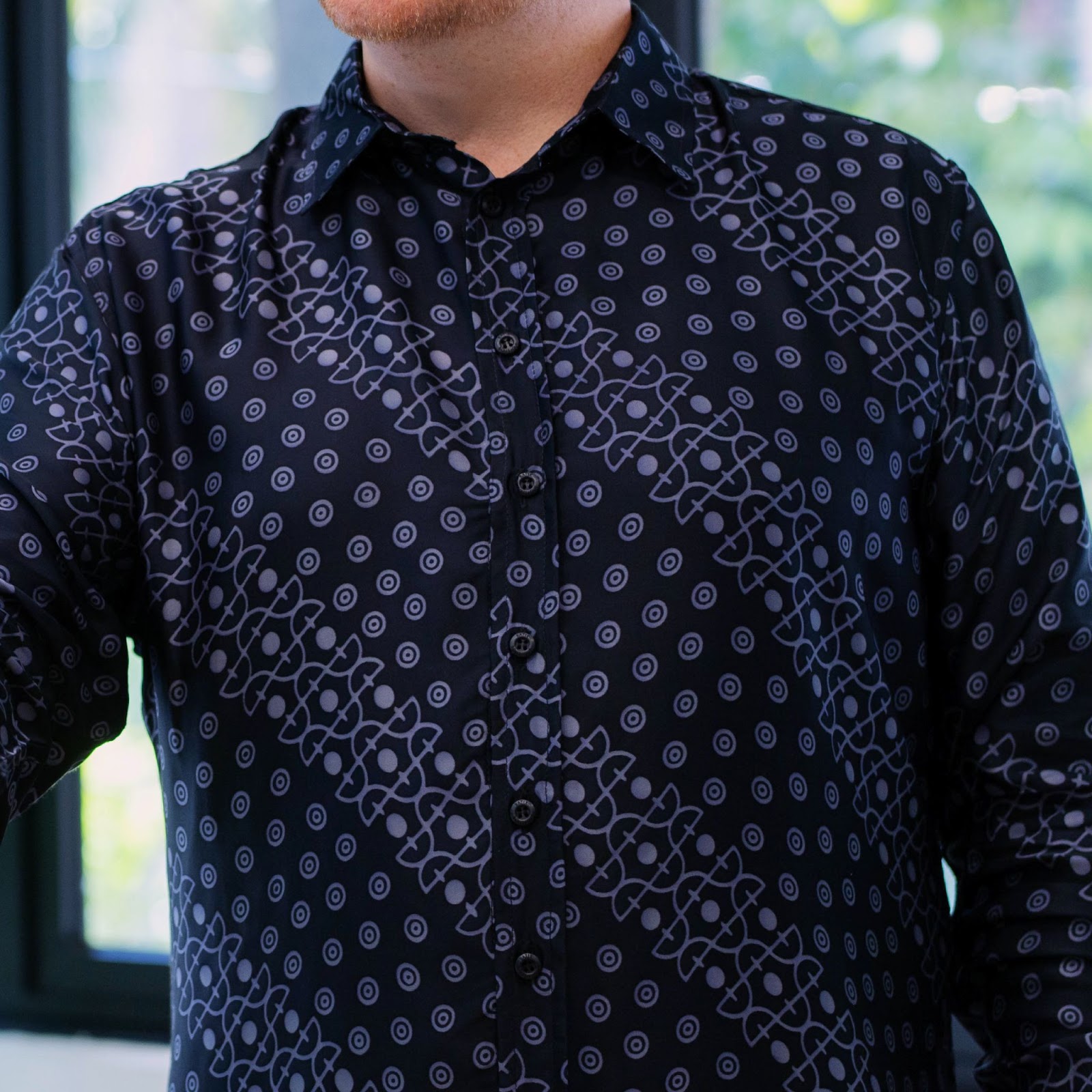 A closeup image of Jet Alur in men batik long sleeved shirt