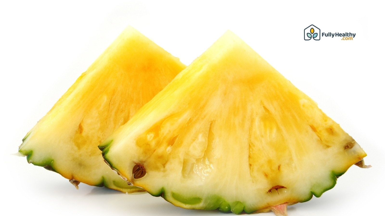 Two pineapple wedges with green rind on clean white background