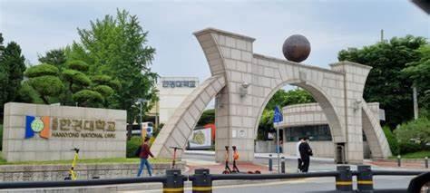 A stone arch with a ball on top

AI-generated content may be incorrect.