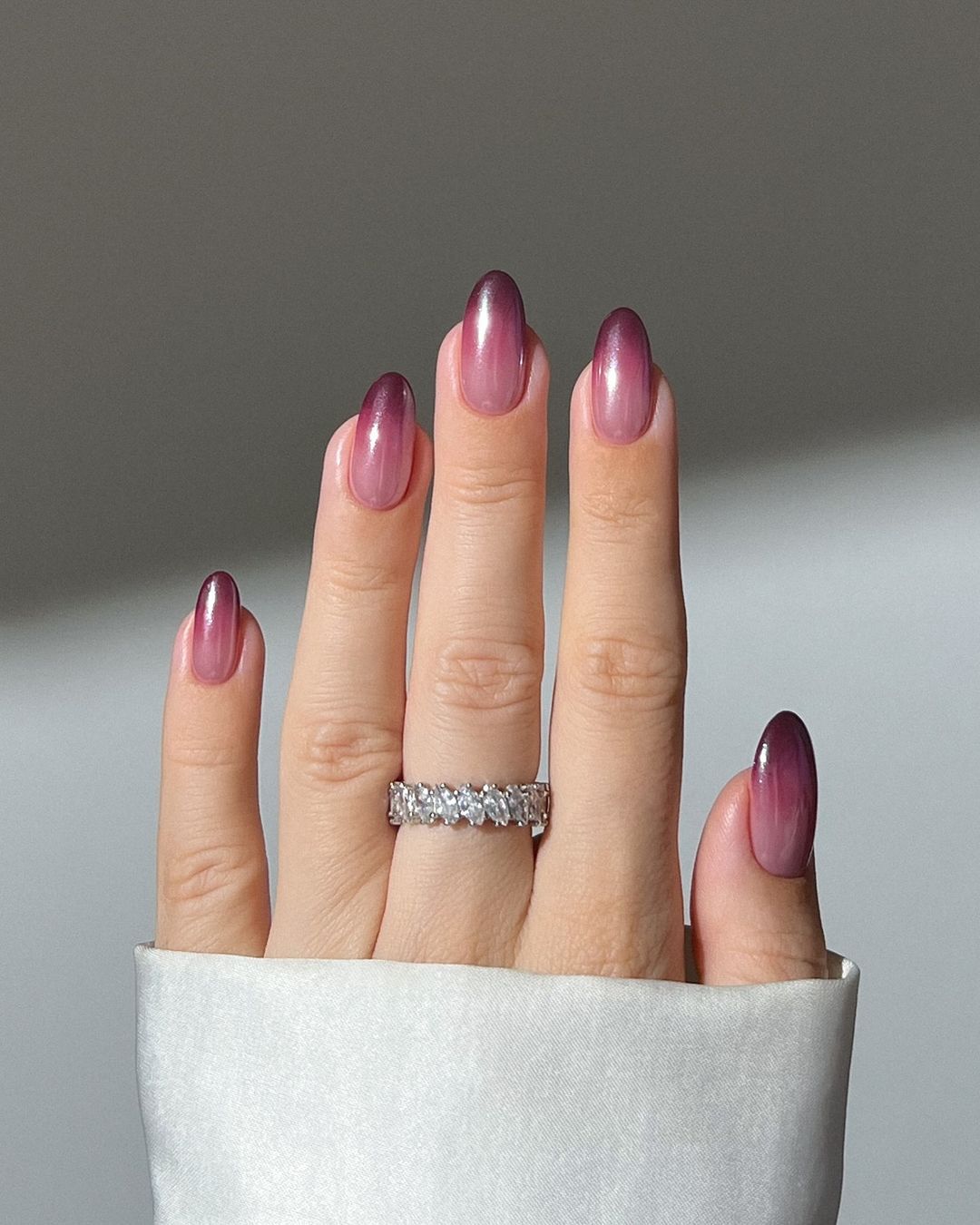 Close-up of hands with fall nail design having Subtle Ombré Effects