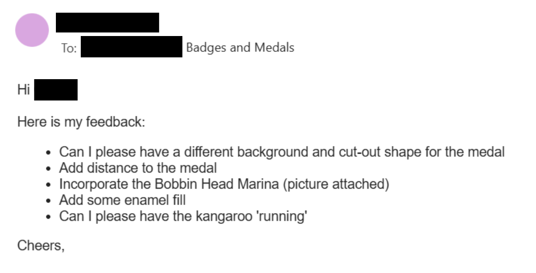 Client providing custom medal artwork feedback.