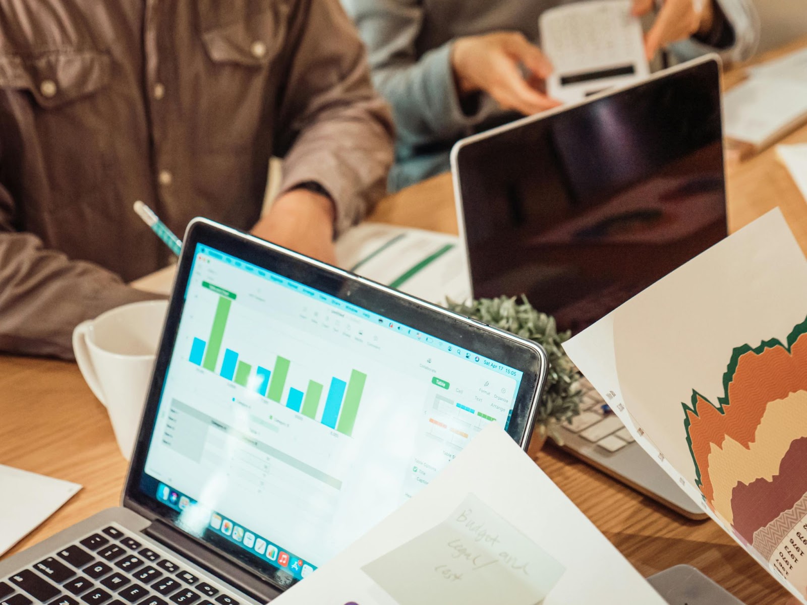 computer employee attendance tracking software on a co-working desk 