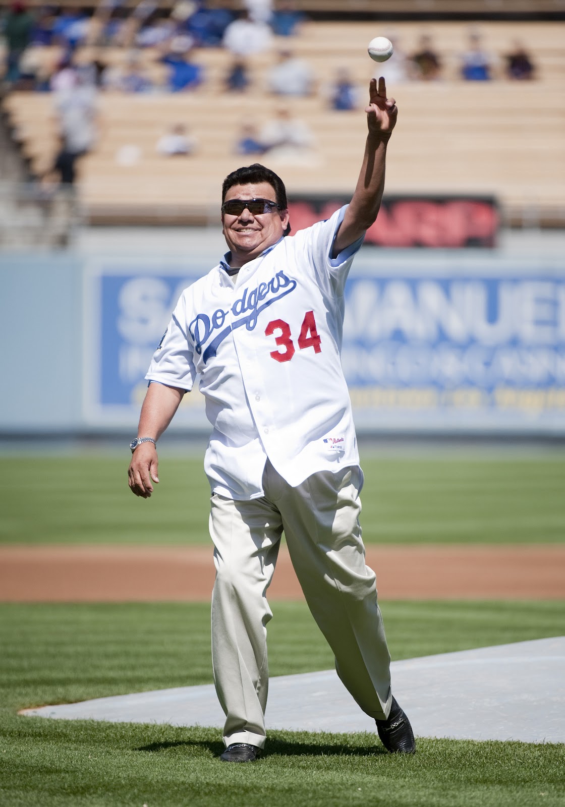 Fernando Valenzuela throws the ceremonial first pitch before a Dodgers vs. Rockies game at Dodger Stadium on September 19, 2010 | Source: Getty Images