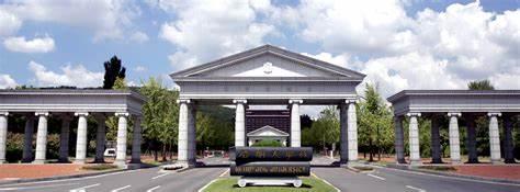 A large stone archway with columns

AI-generated content may be incorrect.