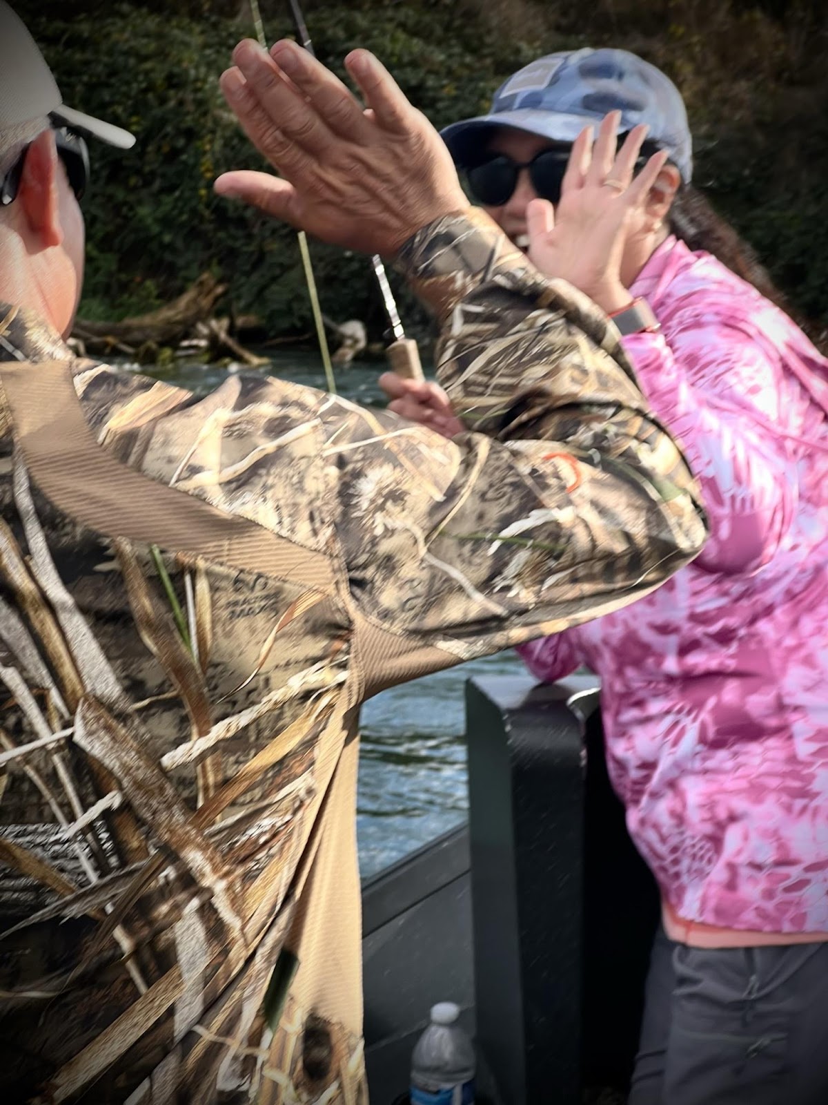 A person and person standing on a boat

AI-generated content may be incorrect.