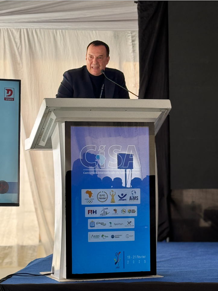 A person standing at a podium

AI-generated content may be incorrect.
