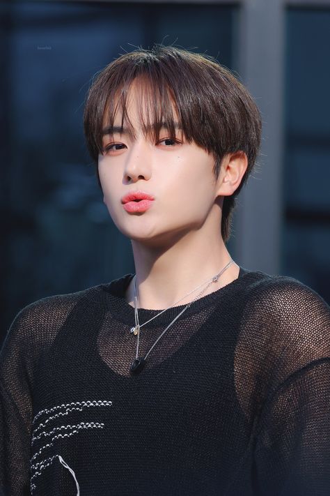 A picture of Kim Hyunjae on black cloth 