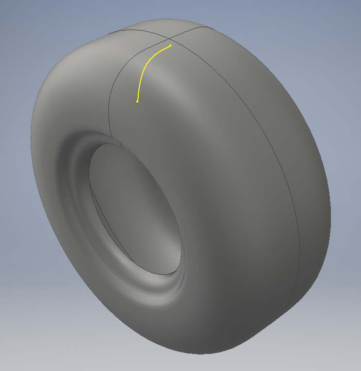 Tire with yellow line going from center of tread face over the rim to the sidewall