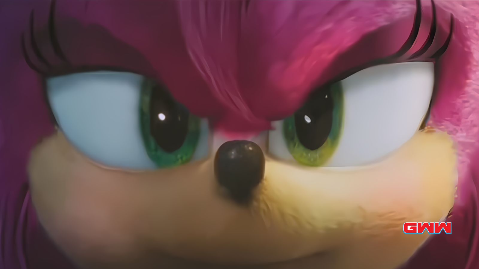 Close-up of a Amy's face with green eyes.