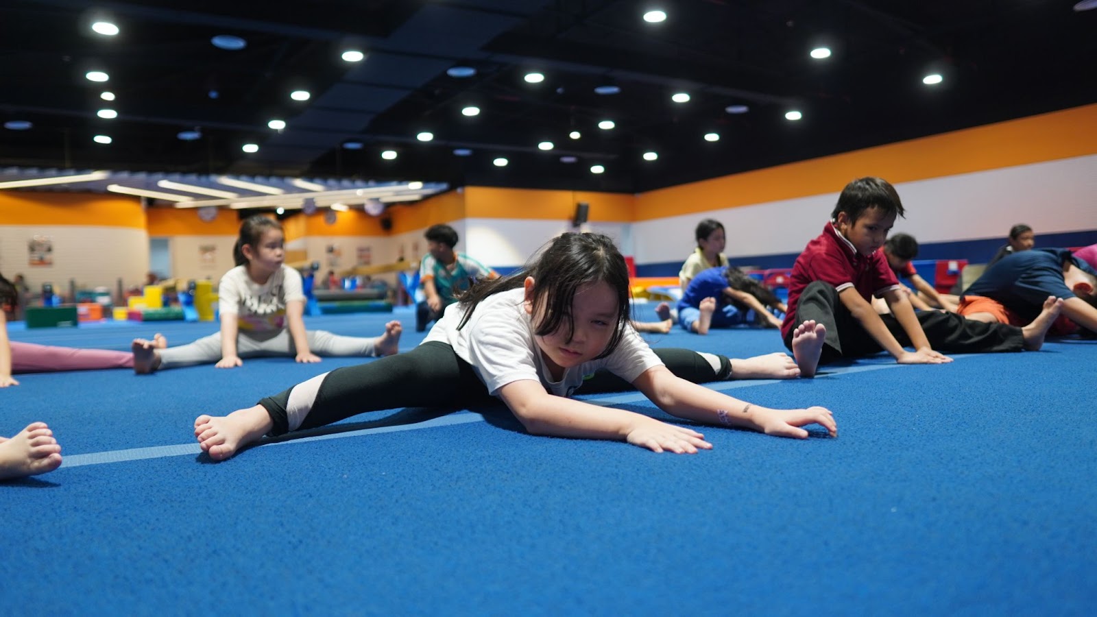 Stretch for a Scorpion - Do a Straddle Stretch