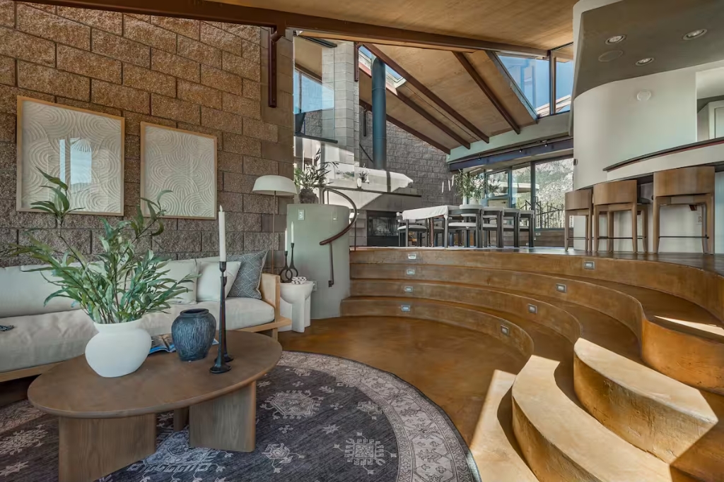 home in albuquerque with stairs open floor plan and large windows looking out on the desert