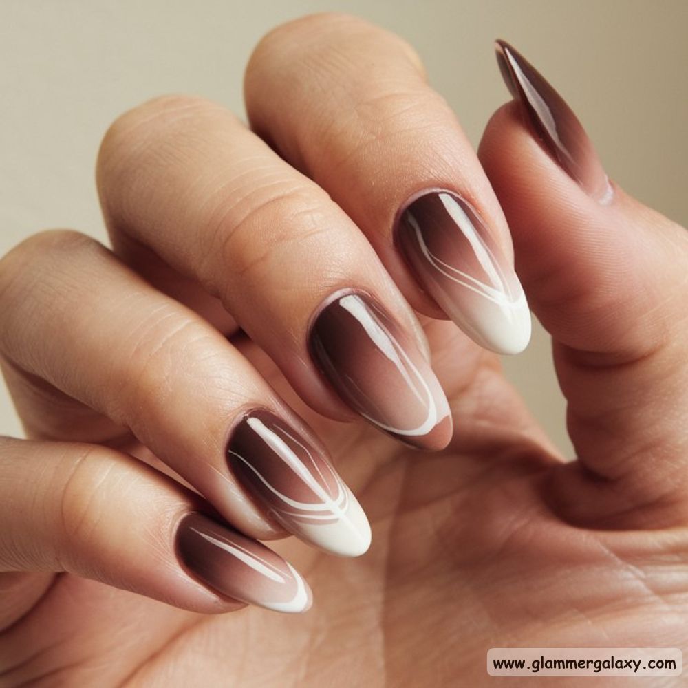 Almond Shaped Nails having Gradient Browns with Swirls