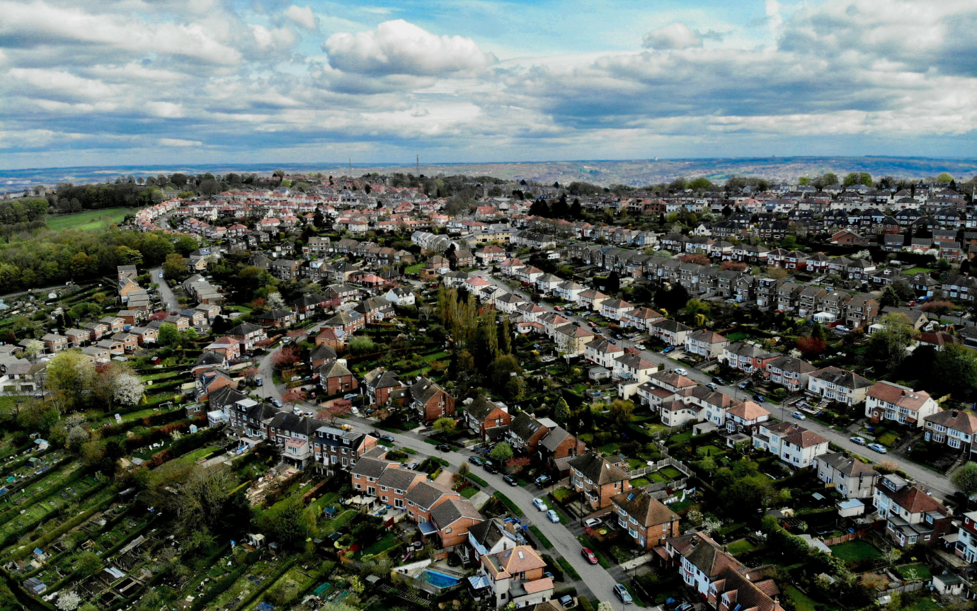 Aerial view of a neighborhoodDescription automatically generated