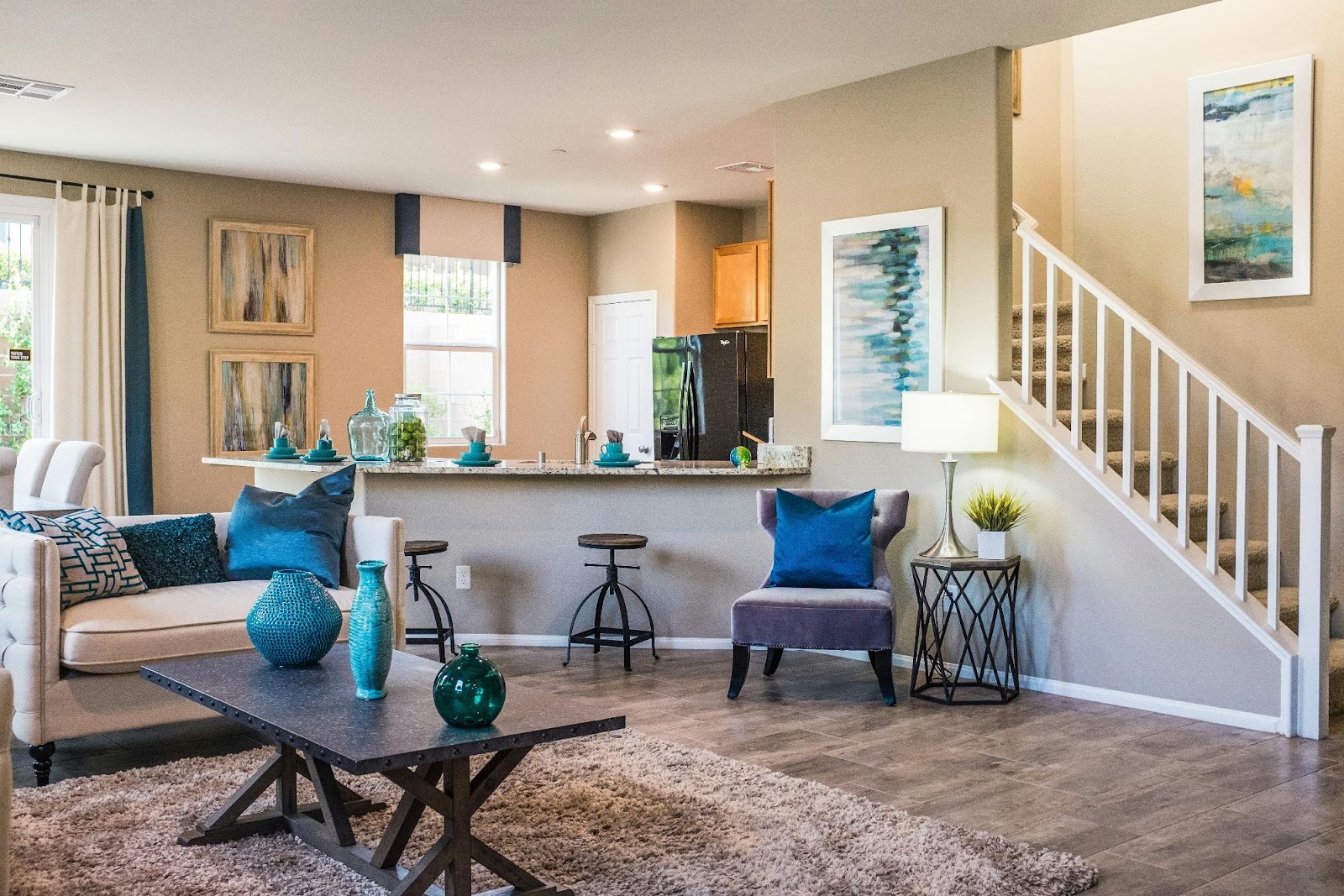 a living room with a staircase