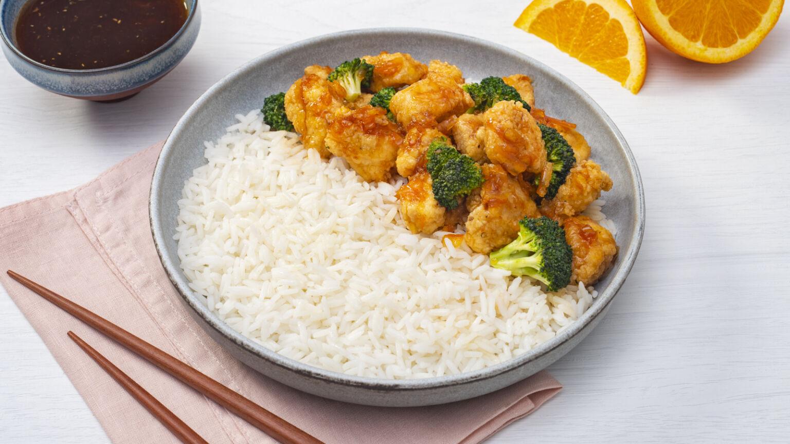 A bowl of rice and chicken

AI-generated content may be incorrect.