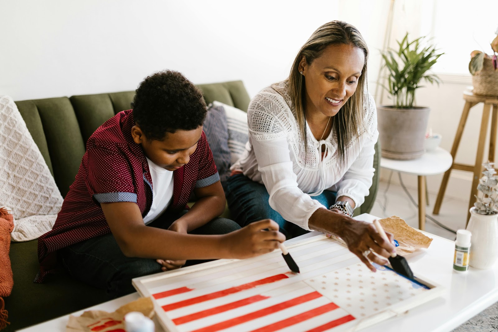 A parent helping their child prepare for homeschooling competitions in South Africa using past papers