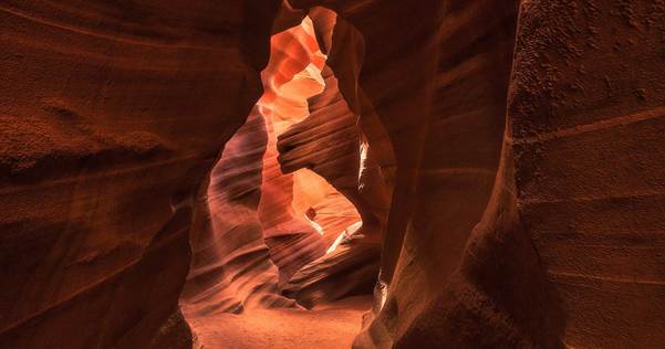 A cave with light coming out of it

AI-generated content may be incorrect.