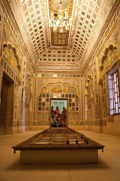 This may contain: the inside of a building with intricately decorated walls