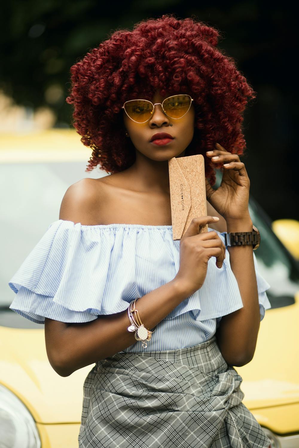A Lady Rocking a Red Hair Dye